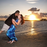 couple kiss sunset tybee portraits